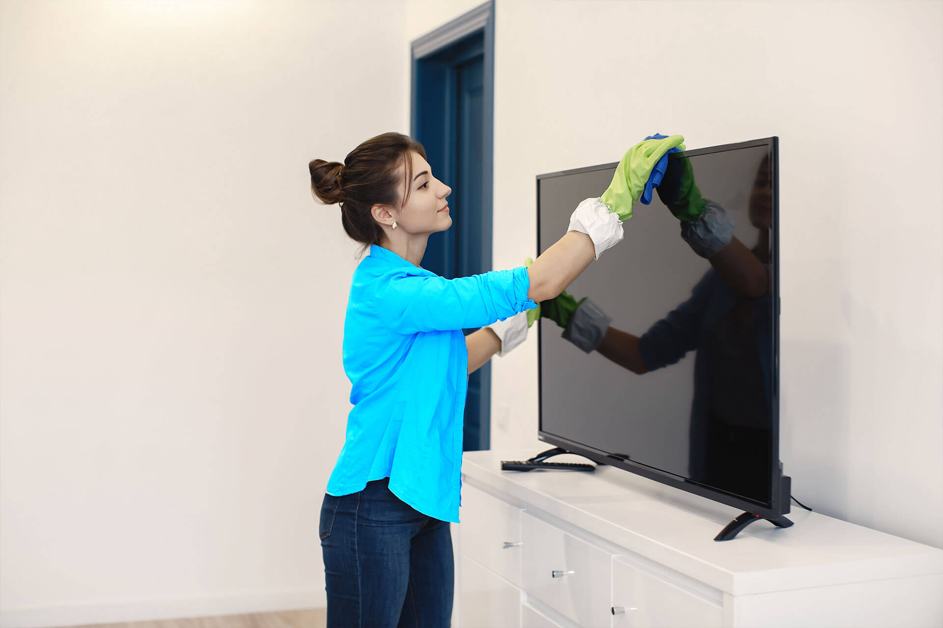 A maid doing an apartment cleaning